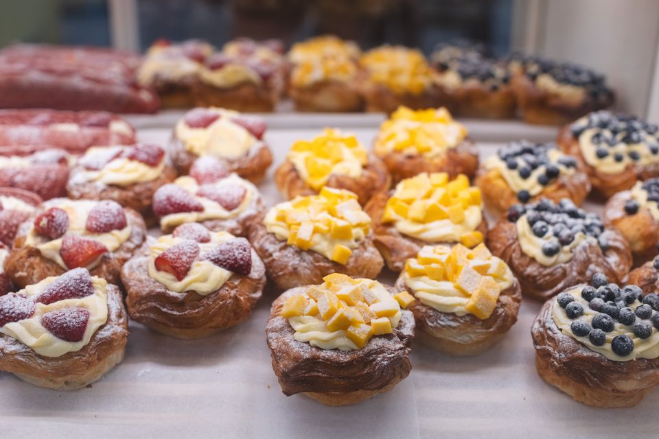 Fruit Danish pastries topped with mango, strawberry and blueberry