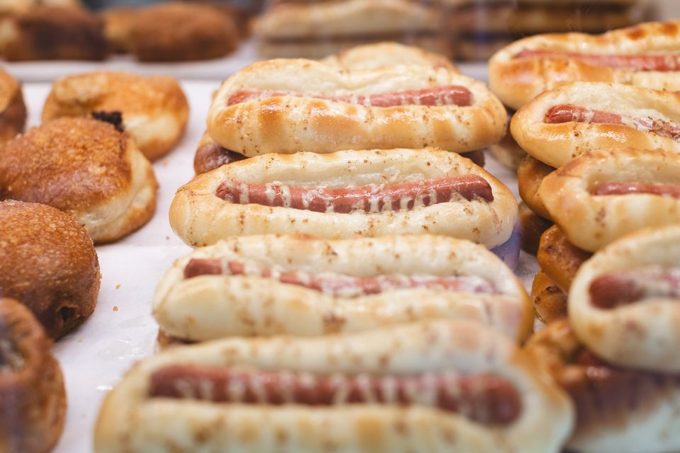 Rows of freshly baked savory pastry sticks