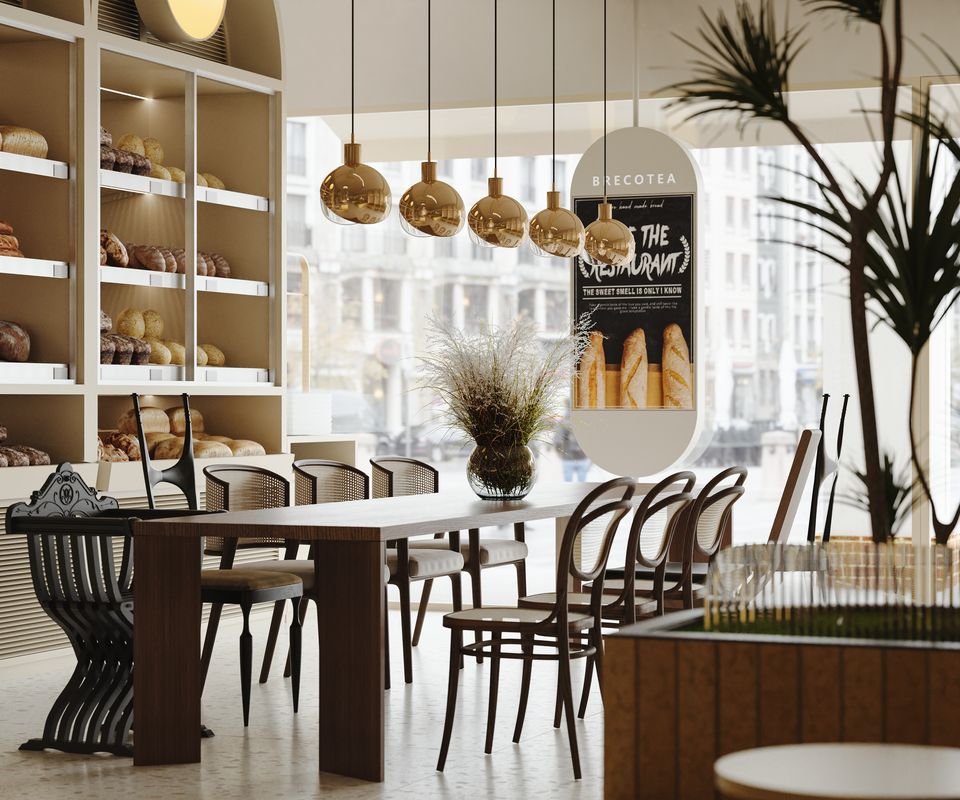 Bread shelves with pendant lights over communal tables